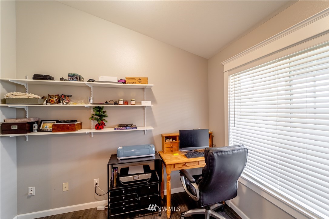 111 Garrett Loop Chehalis, WA 98532 - Photo 11 of 36 a view of a workspace with furniture and a window