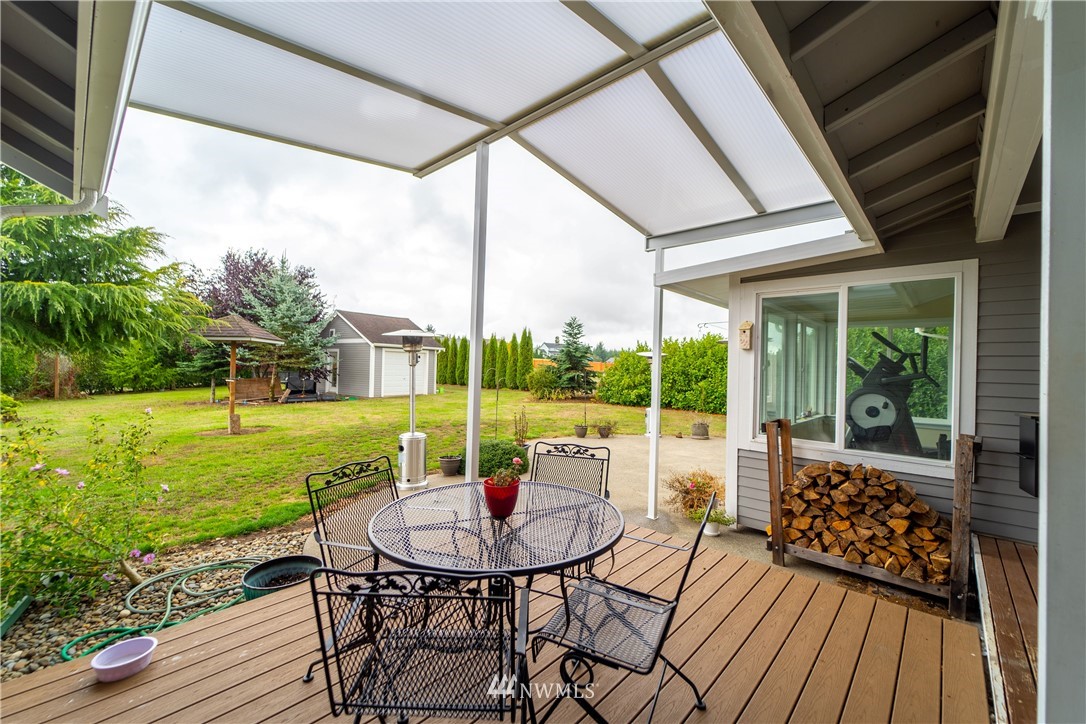 111 Garrett Loop Chehalis, WA 98532 - Photo 22 of 36 a view of an outdoor space with furniture and garden