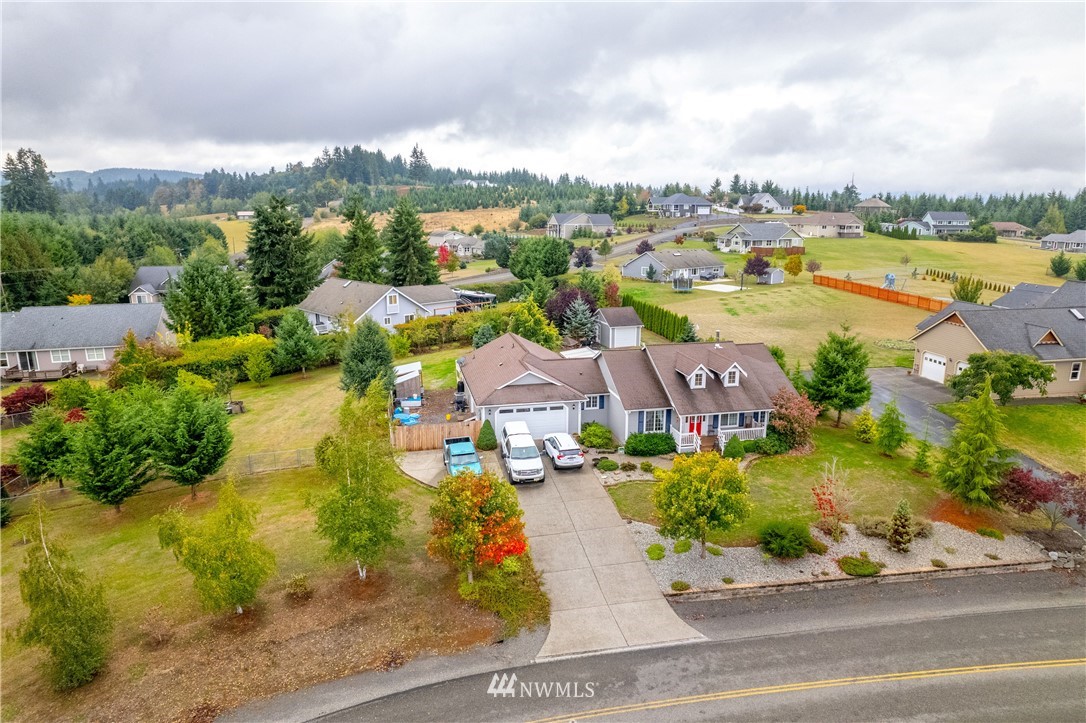 111 Garrett Loop Chehalis, WA 98532 - Photo 31 of 36 an aerial view of residential houses with outdoor space and ocean view