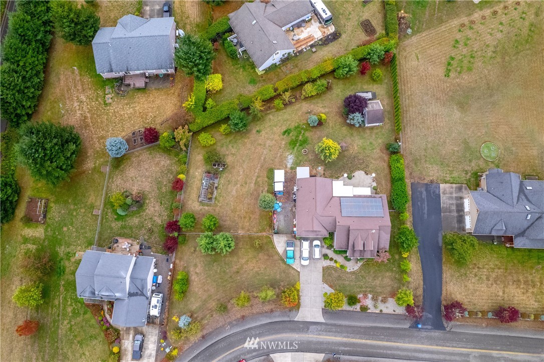 111 Garrett Loop Chehalis, WA 98532 - Photo 34 of 36 an aerial view of residential houses with outdoor space