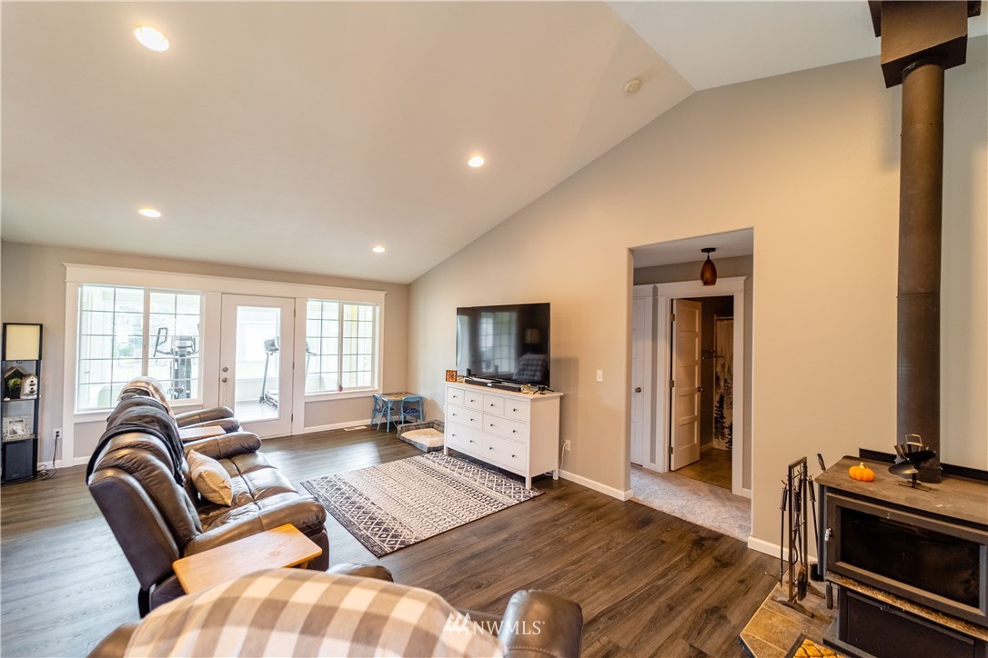 111 Garrett Loop Chehalis, WA 98532 - Photo 5 of 36 a living room with furniture and a flat screen tv