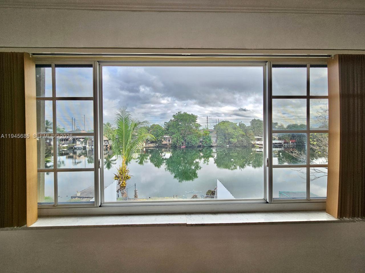 0 West Th Hialeah, FL 33014 - Photo 13 of 21 a view of a window in a room