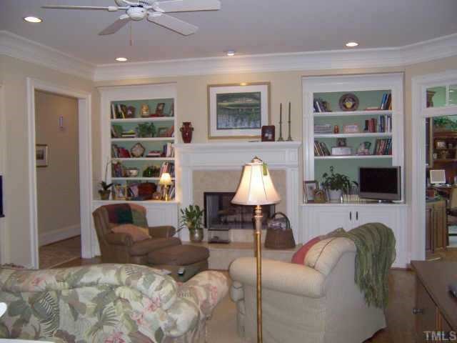 2722 Fairview Road Raleigh, NC 27608 - Photo 6 of 10 a living room with furniture and a flat screen tv