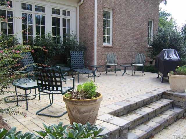 2722 Fairview Road Raleigh, NC 27608 - Photo 10 of 10 a view of a backyard with sitting area and fire pit