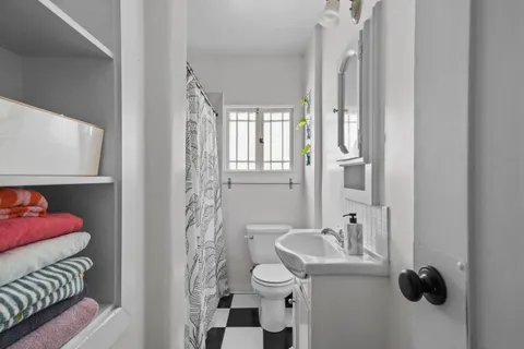 a view of a patio with couches and potted plants