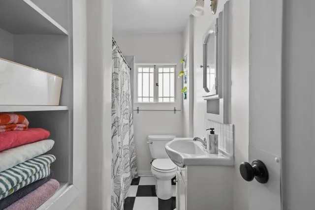 a view of a patio with couches and potted plants