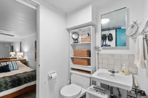 an aerial view of a house with a yard and garden