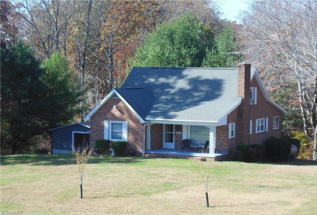 1694 Phillips Road Sandy Ridge, NC 27046 - Photo 1 of 25 1950 Brick Cottage