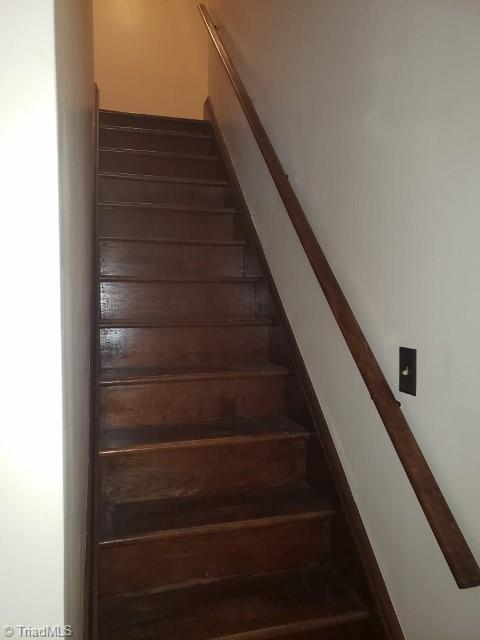 1694 Phillips Road Sandy Ridge, NC 27046 - Photo 14 of 25 Staircase to upper level