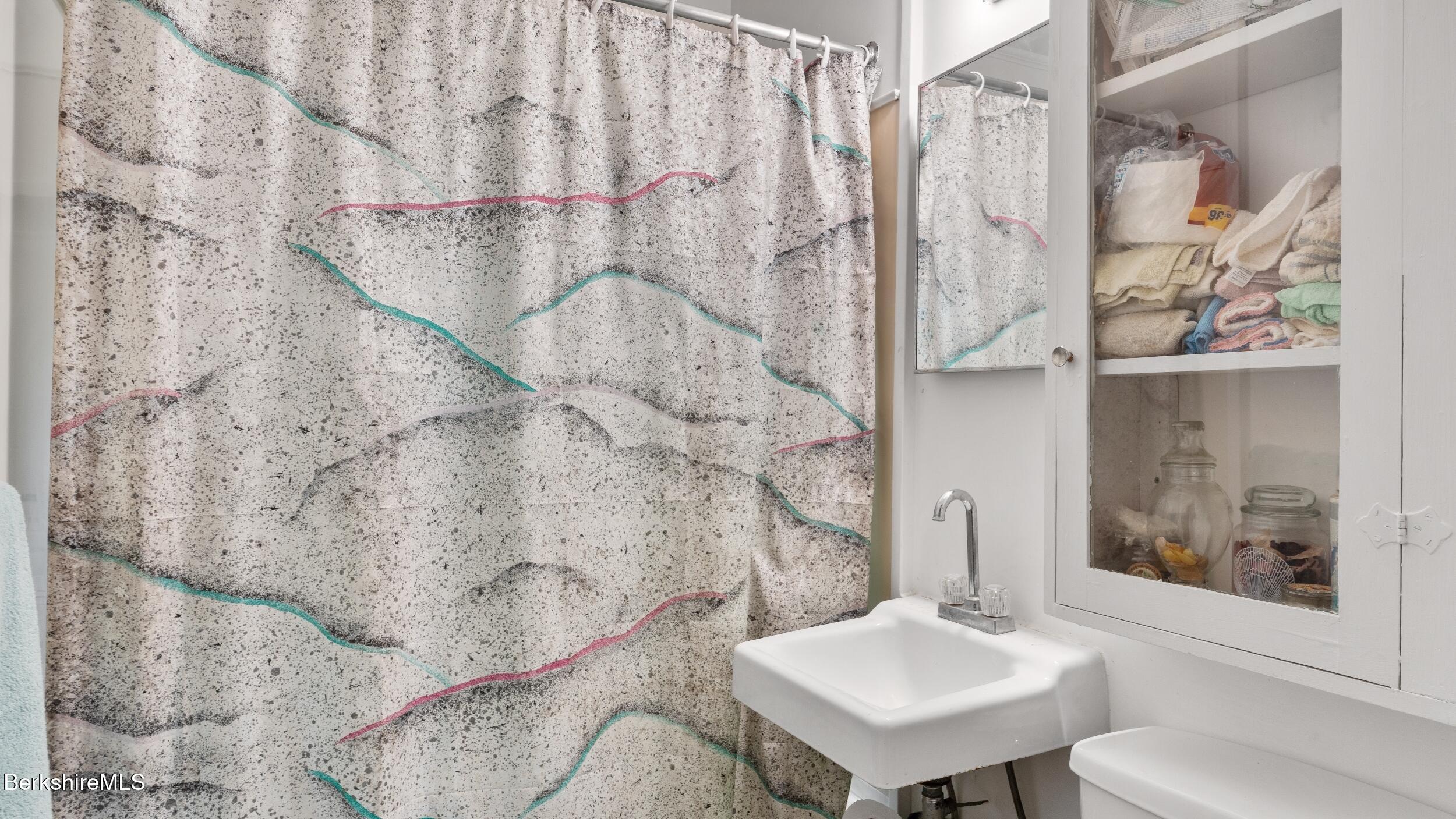 7 Mahkeenac Heights Road Stockbridge, MA 01262 - Photo 12 of 17 a bathroom with a sink and mirror