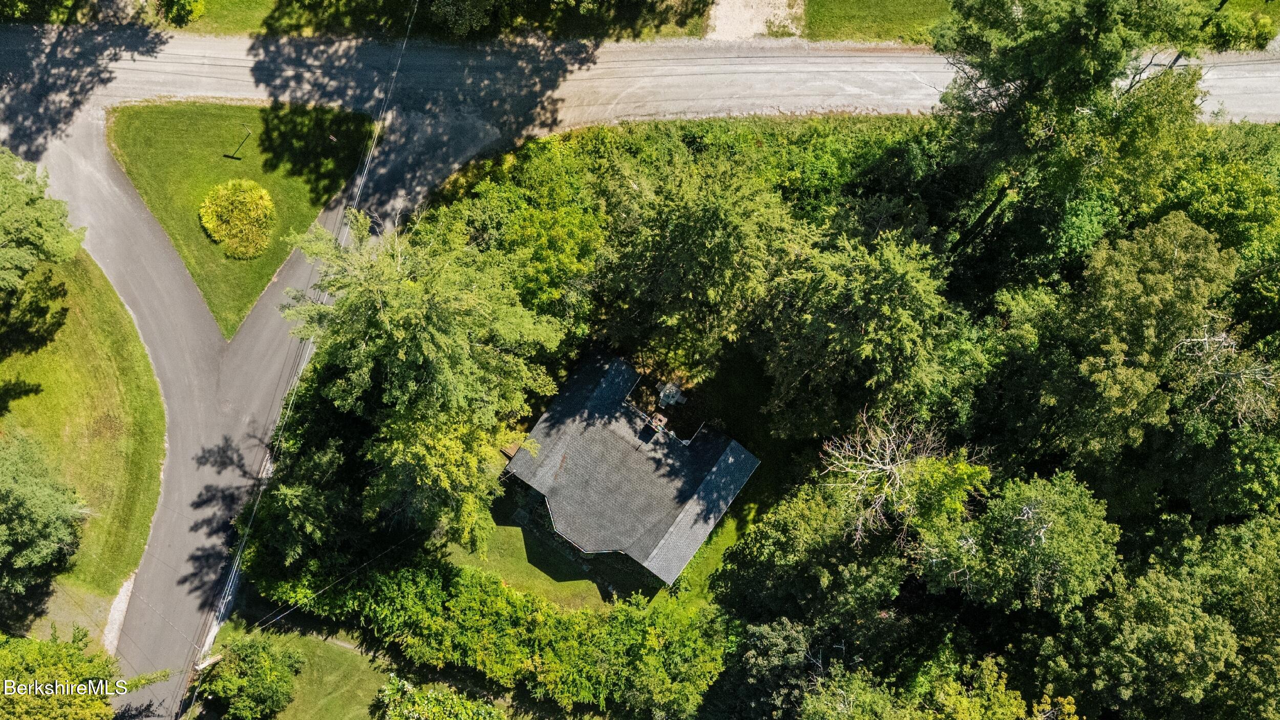 7 Mahkeenac Heights Road Stockbridge, MA 01262 - Photo 17 of 17 an aerial view of a house with a yard and garden