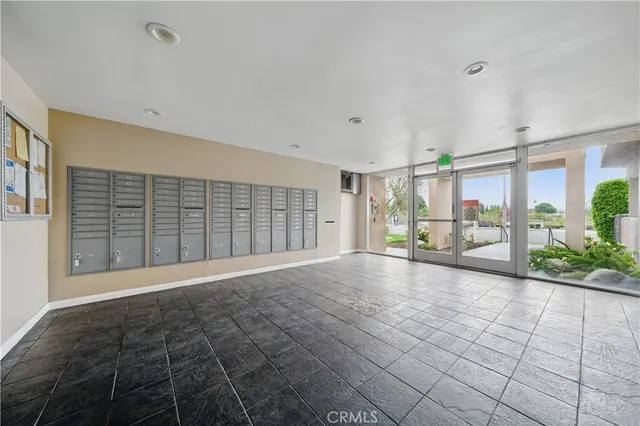 a view of an empty room with windows