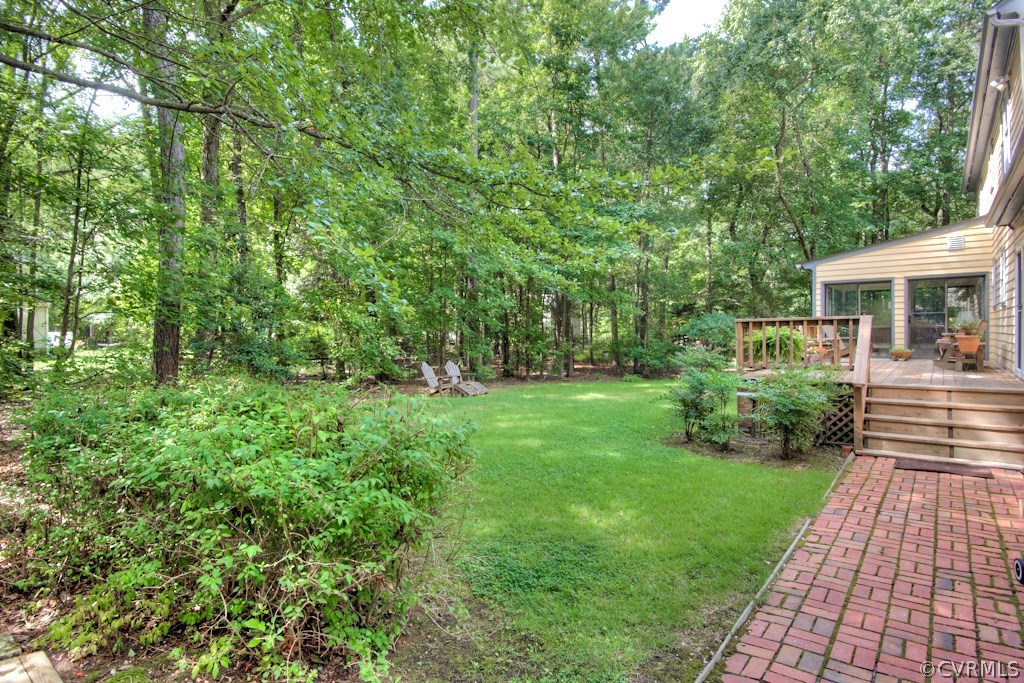 3111 East Brigstock Road Midlothian, VA 23113 - Photo 26 of 32 a view of house with a yard