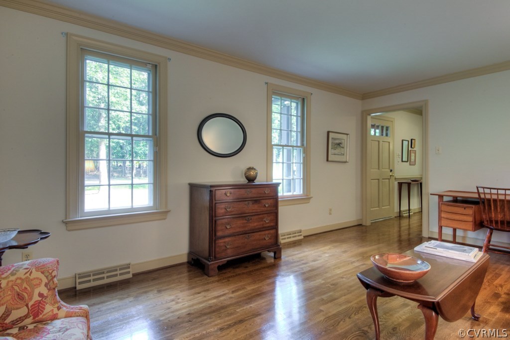 3111 East Brigstock Road Midlothian, VA 23113 - Photo 5 of 32 a living room with furniture and a window