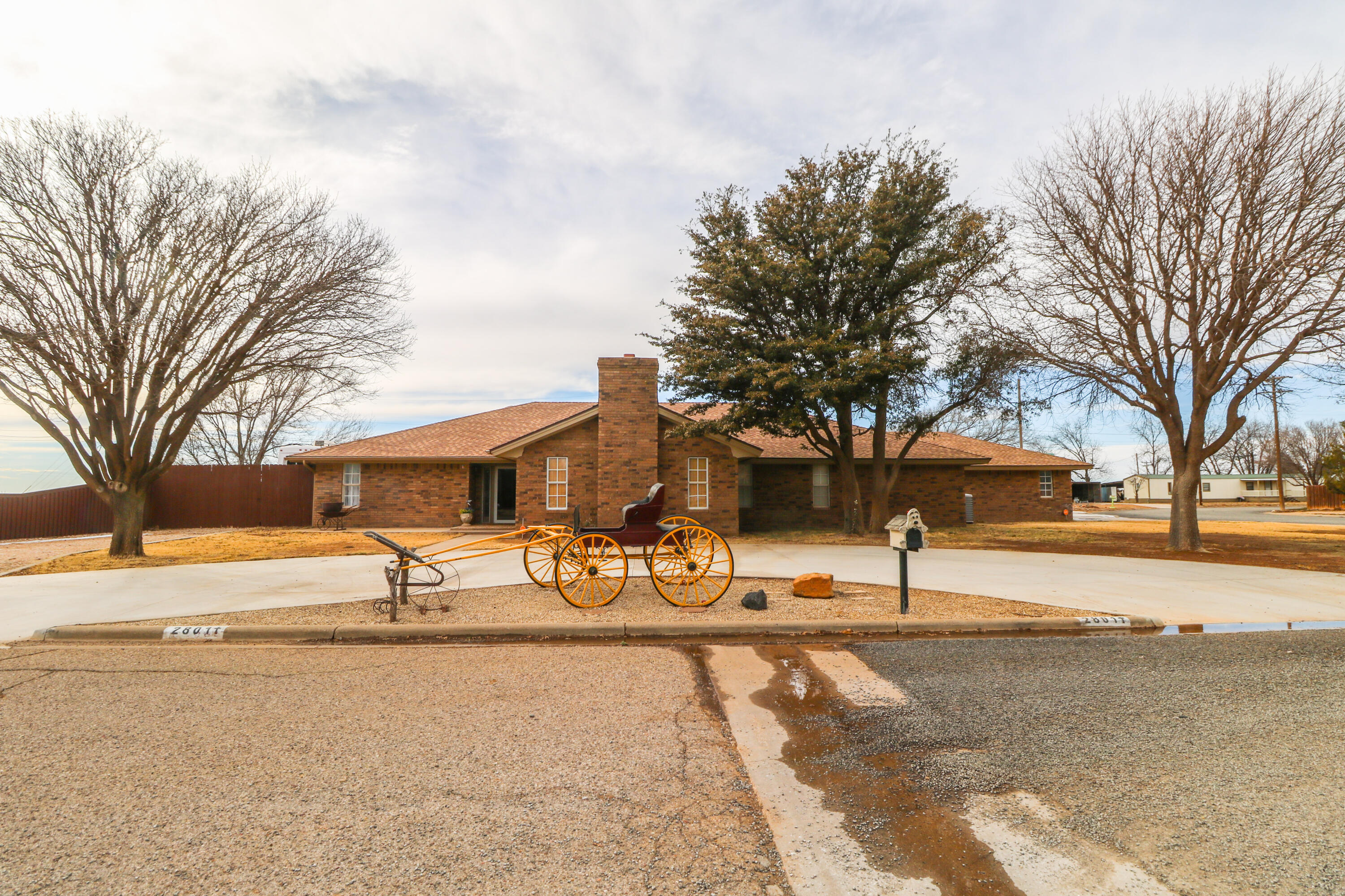 2801 Phelps Avenue Littlefield, TX 79339 - Photo 1 of 38 a view of a yard with a tree