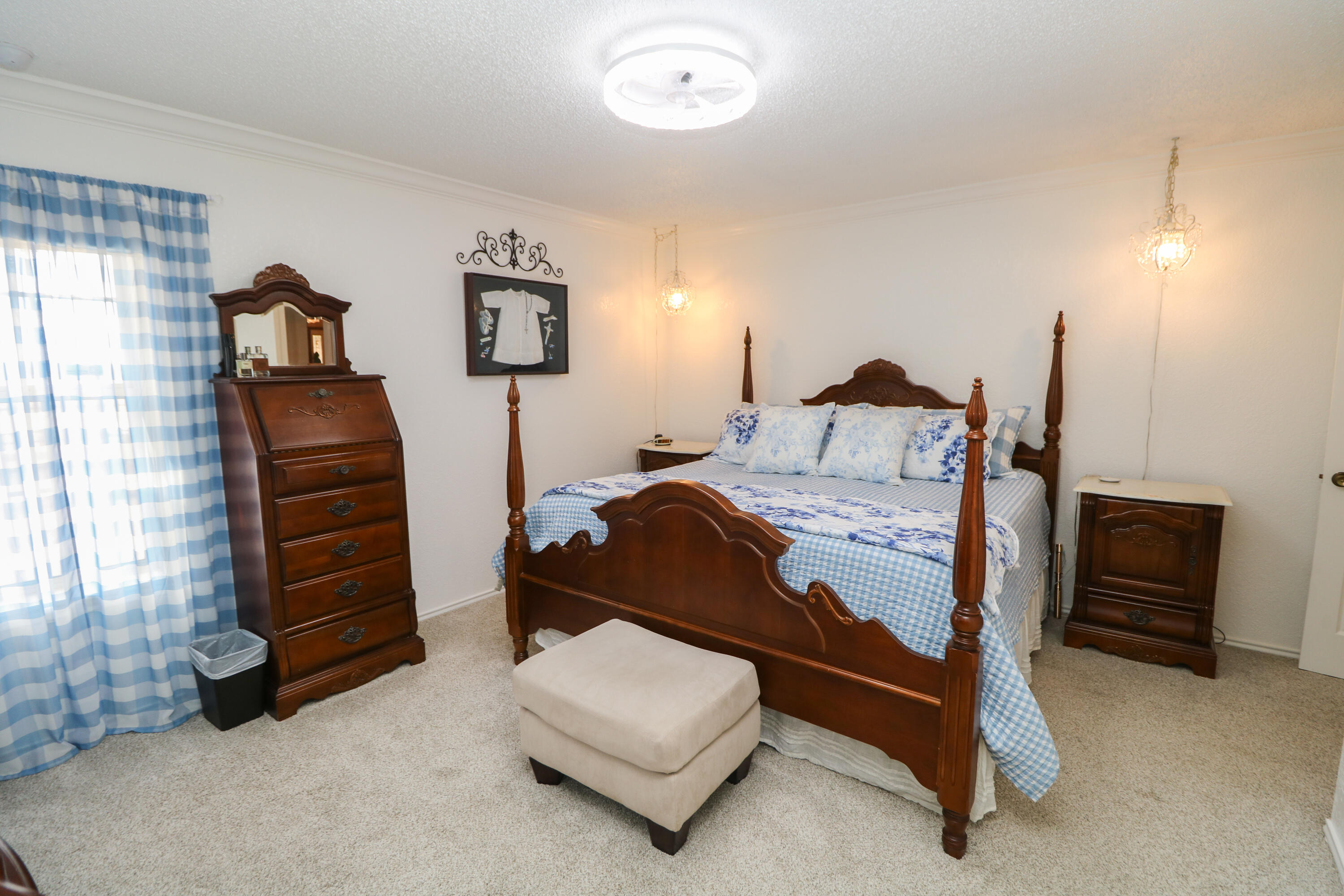 2801 Phelps Avenue Littlefield, TX 79339 - Photo 22 of 38 a bedroom with a bed and a chair