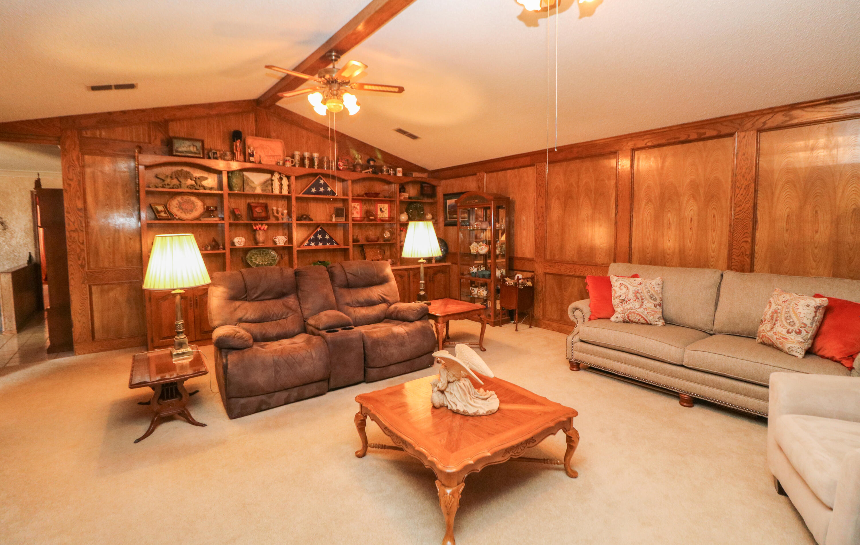 2801 Phelps Avenue Littlefield, TX 79339 - Photo 3 of 38 a living room with furniture and a flat screen tv