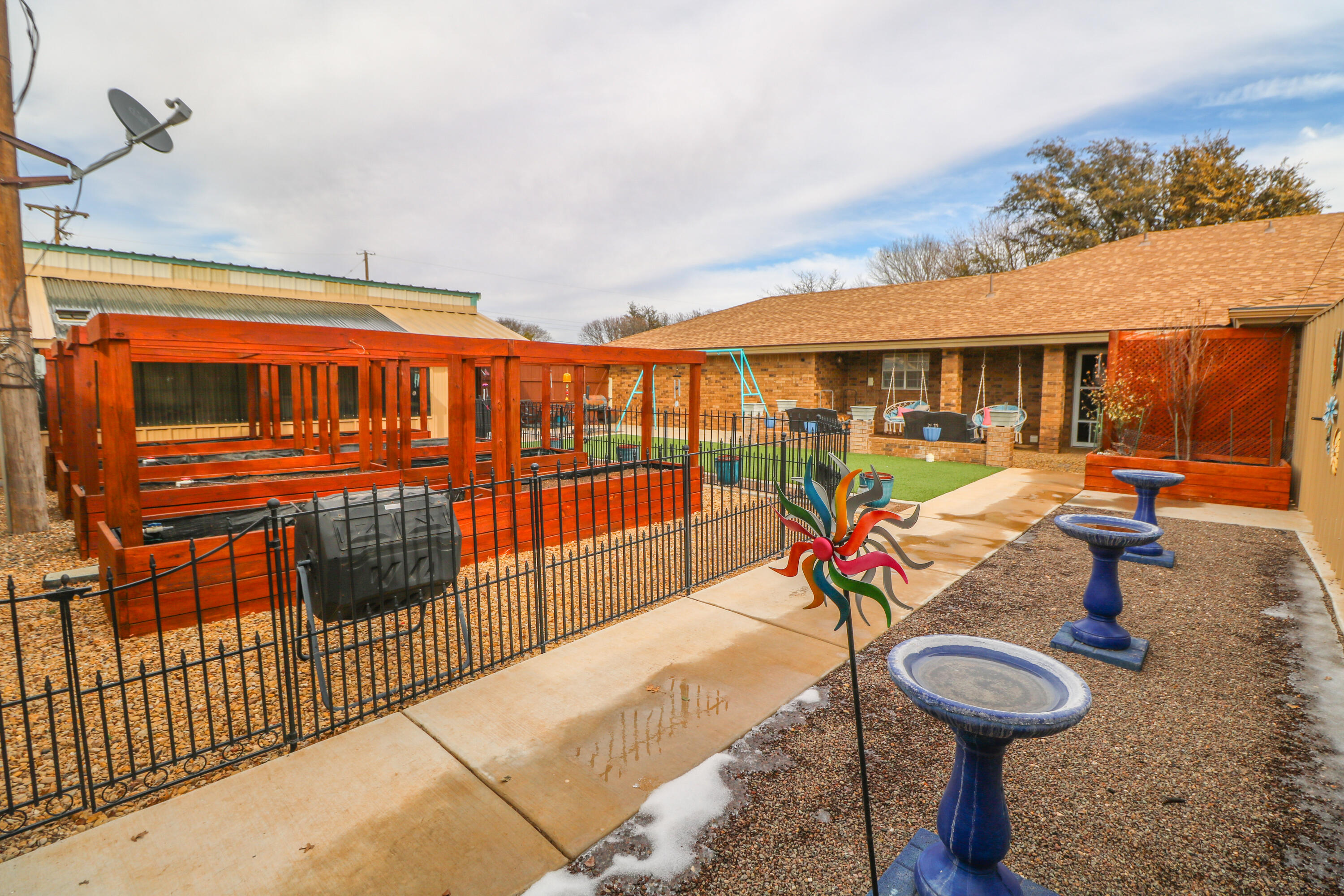 2801 Phelps Avenue Littlefield, TX 79339 - Photo 32 of 38 a front view of a house with outdoor seating