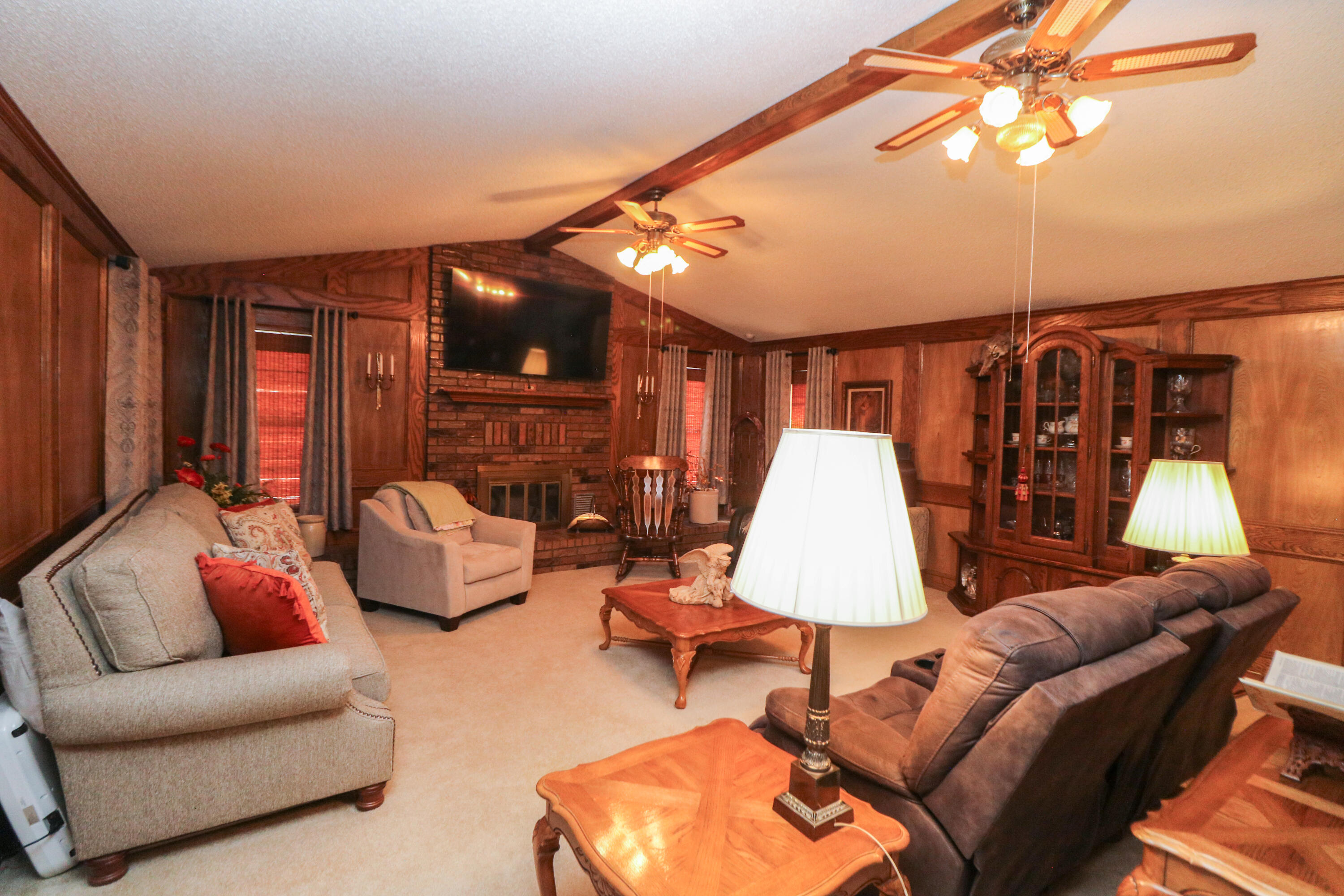2801 Phelps Avenue Littlefield, TX 79339 - Photo 4 of 38 a living room with furniture and a flat screen tv