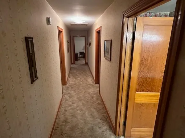 a view of hallway with stairs
