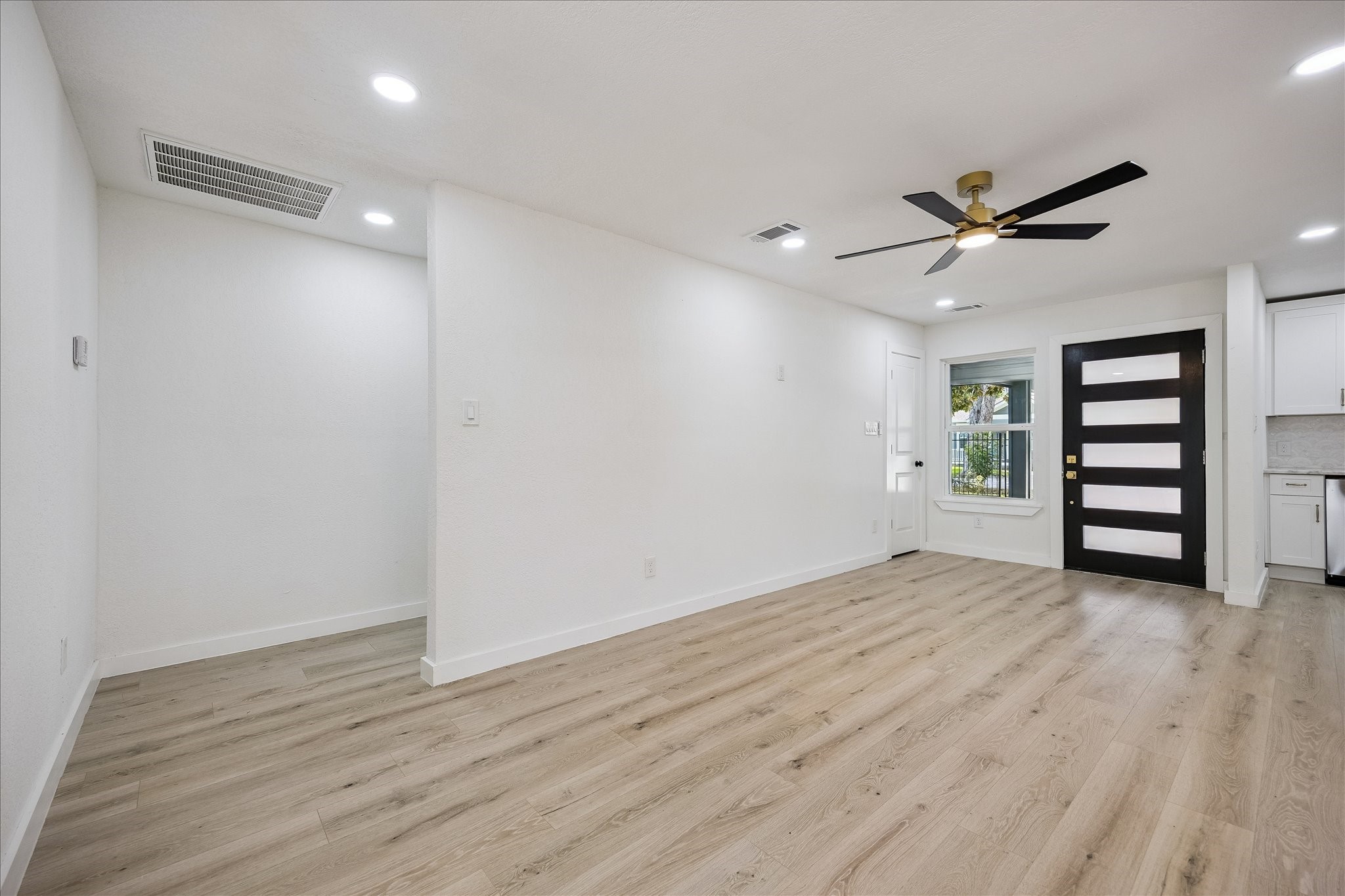 1630 Tabor Street Houston, TX 77009 - Photo 7 of 25 Luxury vinyl plank floors throughout the entire home.