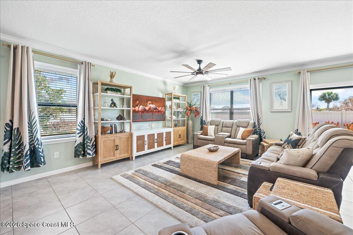 7499 Tourmaline Drive Grant, FL 32949 - Photo 11 of 41 a living room with furniture and a large window