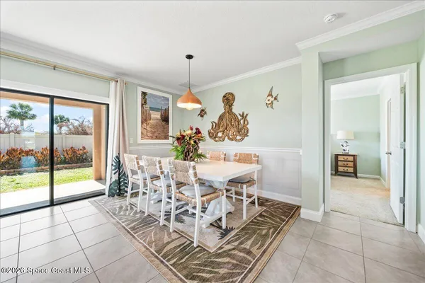 a view of a dining room and furniture