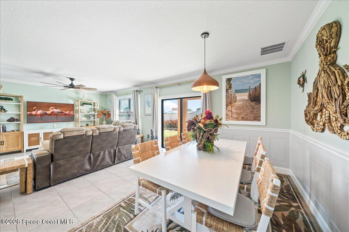 7499 Tourmaline Drive Grant, FL 32949 - Photo 13 of 41 a view of a dining room and furniture
