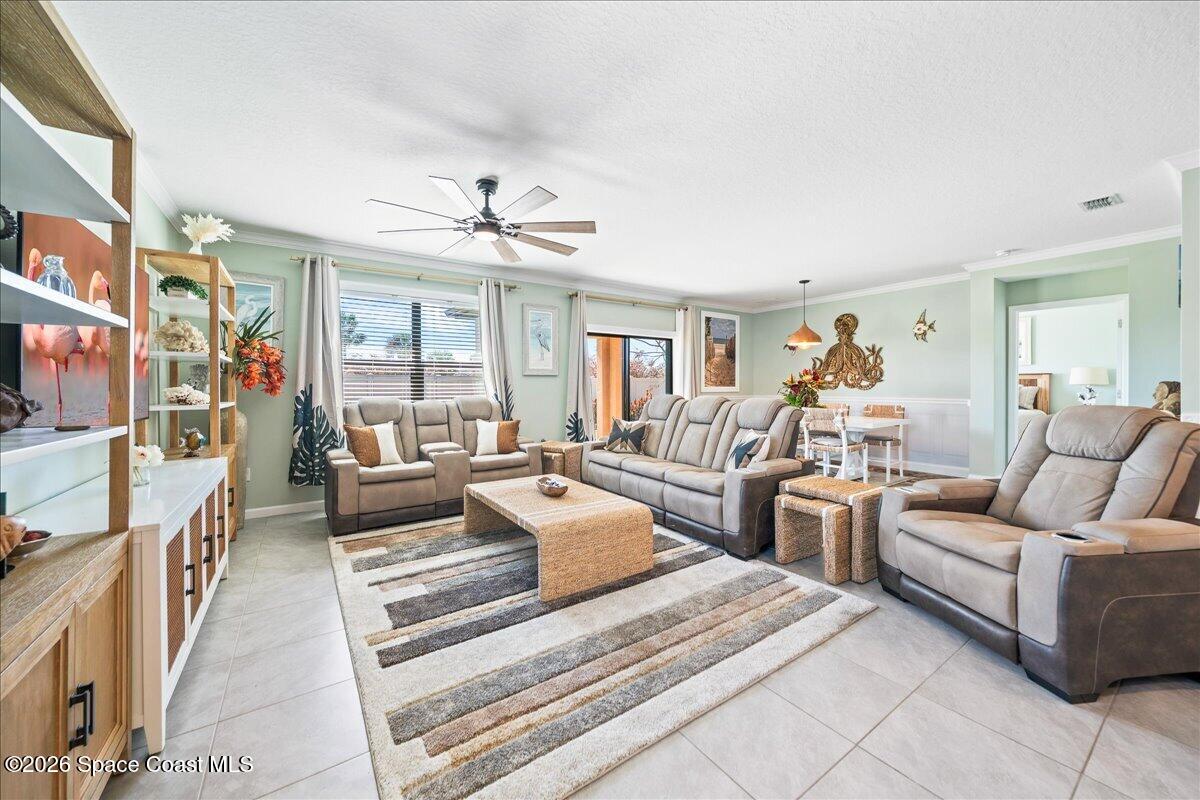 7499 Tourmaline Drive Grant, FL 32949 - Photo 10 of 41 a living room with furniture and a large window