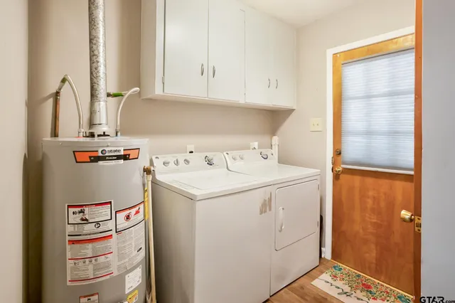 a utility room with dryer and washer