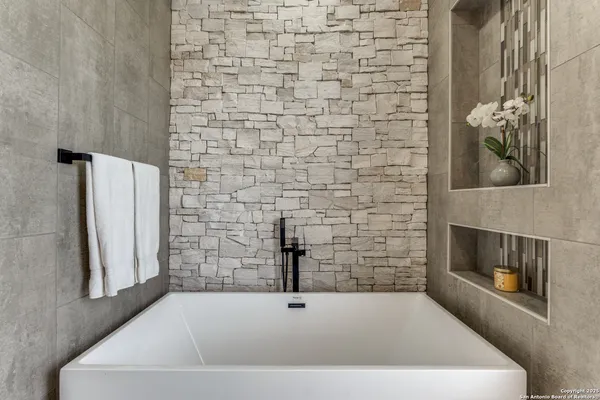 a bathroom with a bathtub