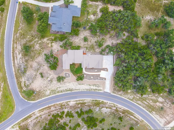 view of balcony with wooden floor and lake view