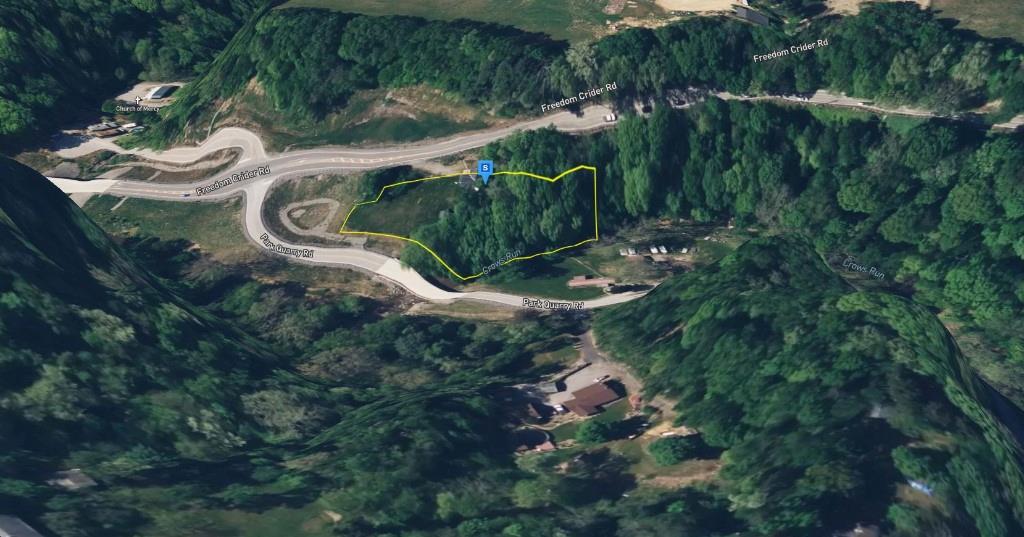 490 Freedom Crider Road Freedom, PA 15042 - Photo 2 of 22 a backyard of a house with outdoor seating and green space