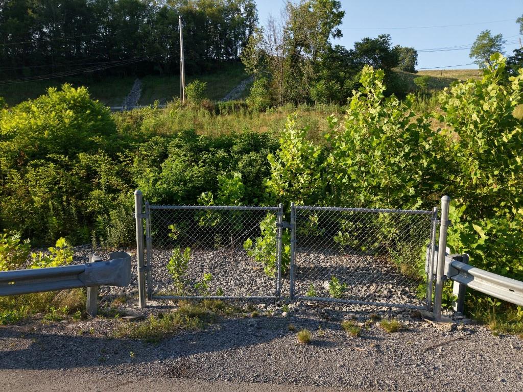 490 Freedom Crider Road Freedom, PA 15042 - Photo 9 of 22 a backyard of a house with lots of green space