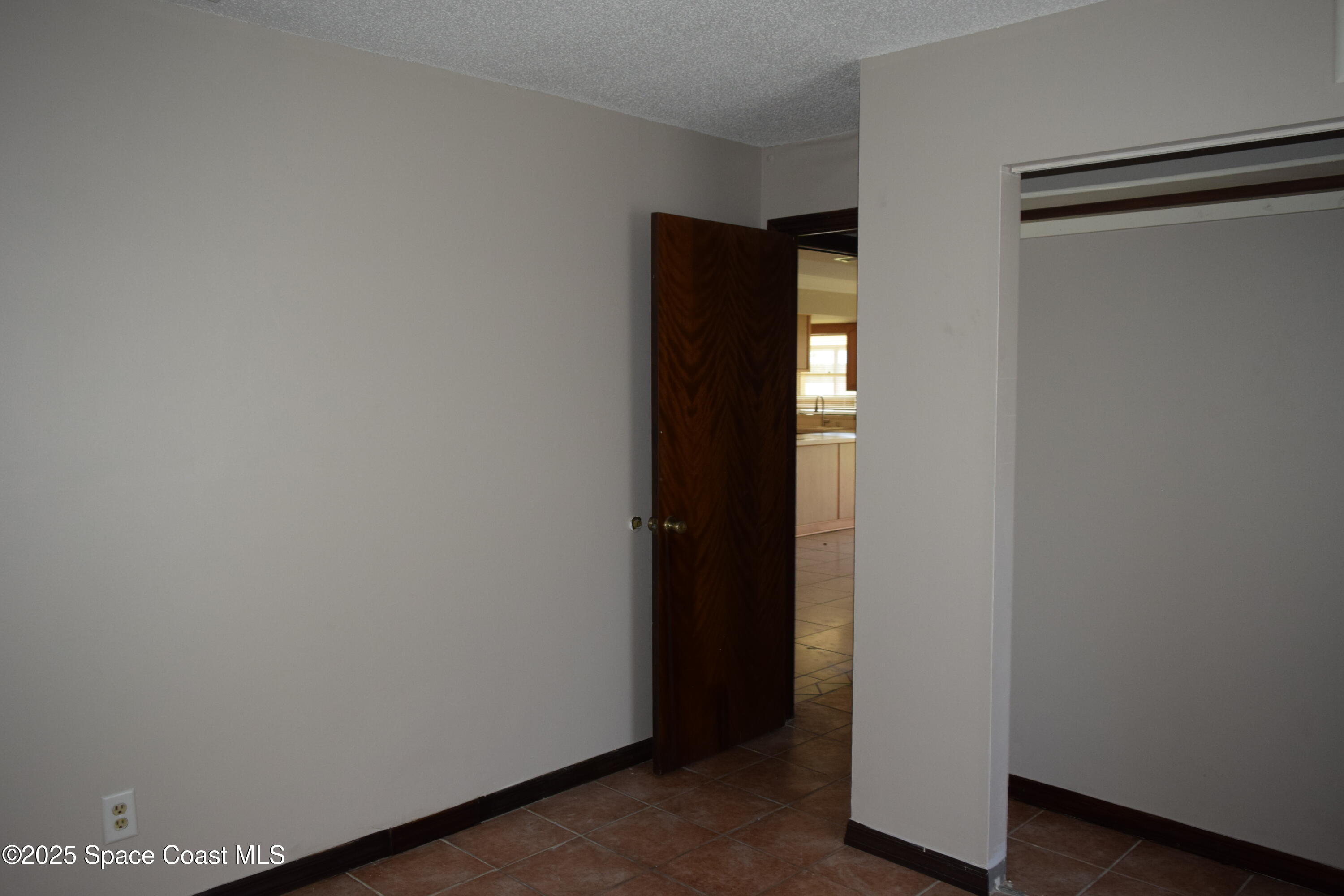 1941 Talloak Road Melbourne, FL 32935 - Photo 15 of 34 a view of an empty room