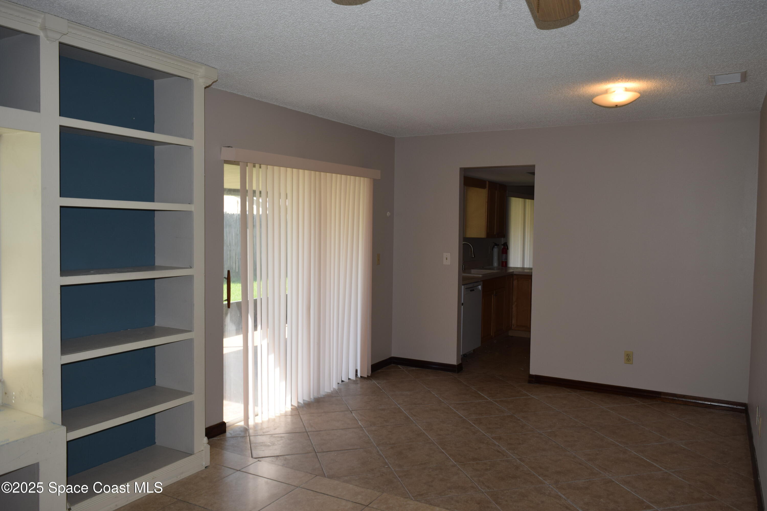 1941 Talloak Road Melbourne, FL 32935 - Photo 27 of 34 a view of an empty room with closet