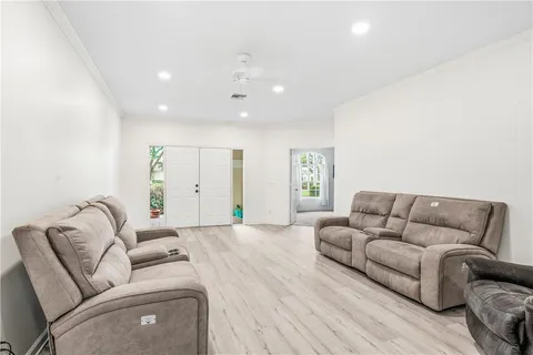 a living room with furniture and a couch