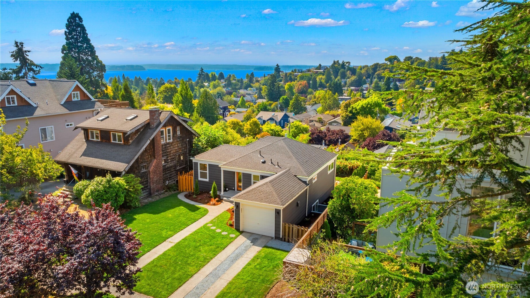 4507 45th Avenue Southwest Seattle, WA 98116 - Photo 1 of 1 an aerial view of a house with a yard basket ball court and outdoor seating