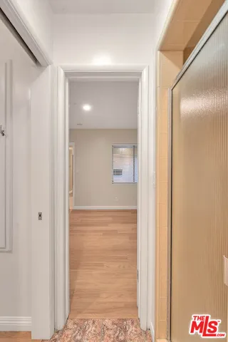 a kitchen with stainless steel appliances granite countertop a sink and a window