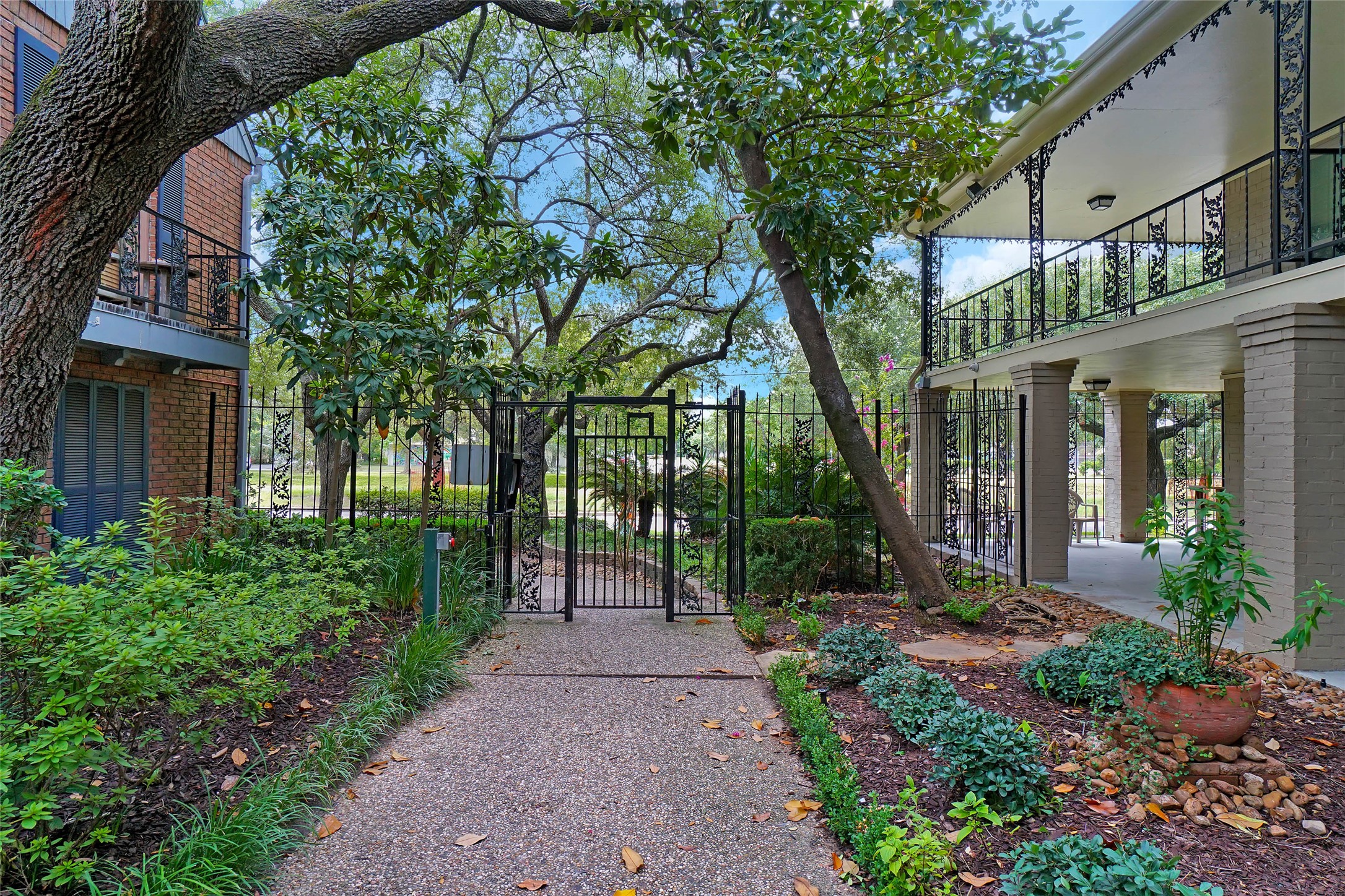 Lush landscaping in this quiet gated community