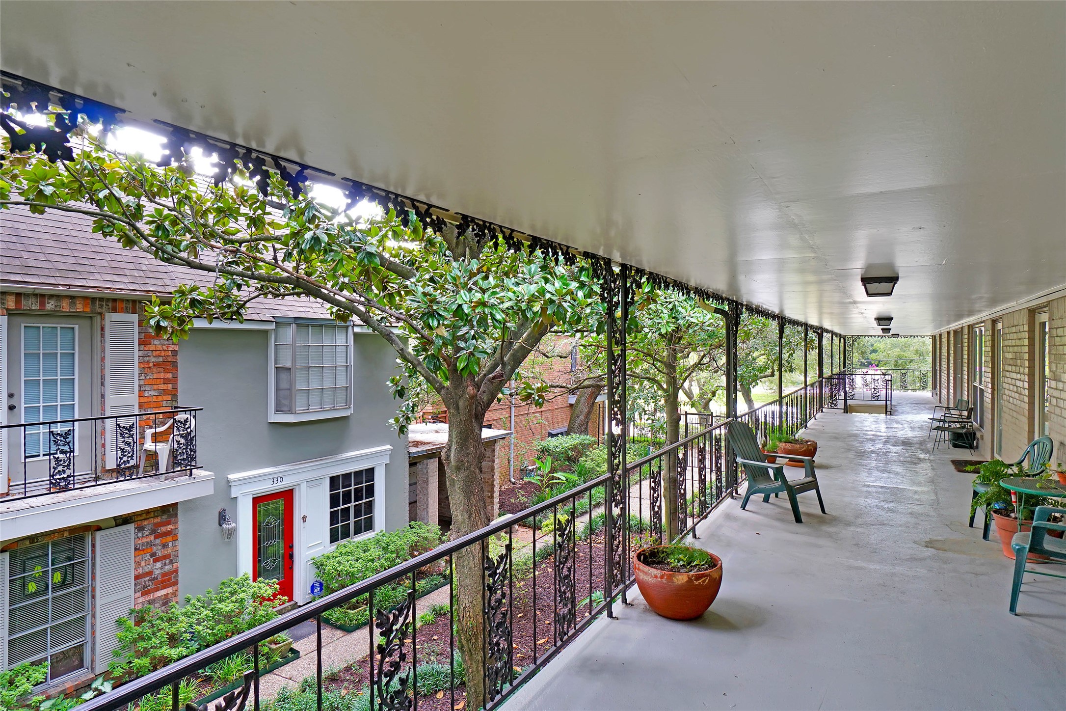 11550 Chimney Rock Road, Unit 324 Houston, TX 77035 - Photo 5 of 24 View from shared balcony outside of the unit