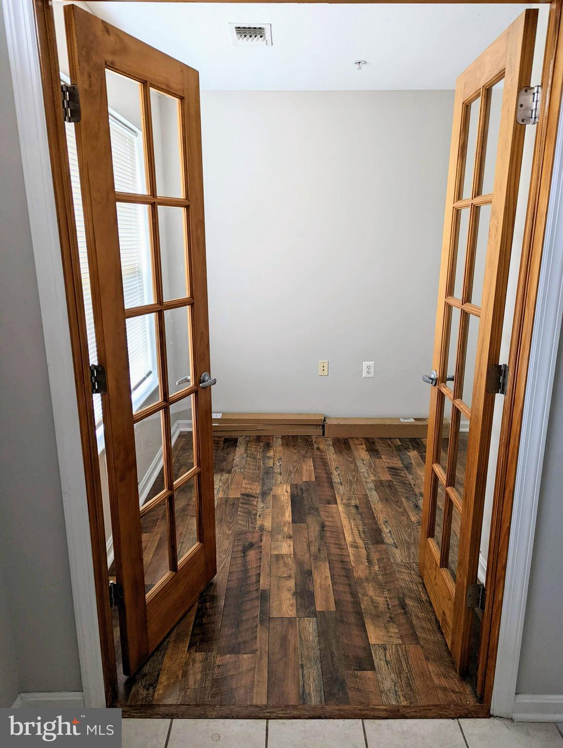 21765 Ascot Court Ashburn, VA 20147 - Photo 2 of 32 a view of wooden floor in a room