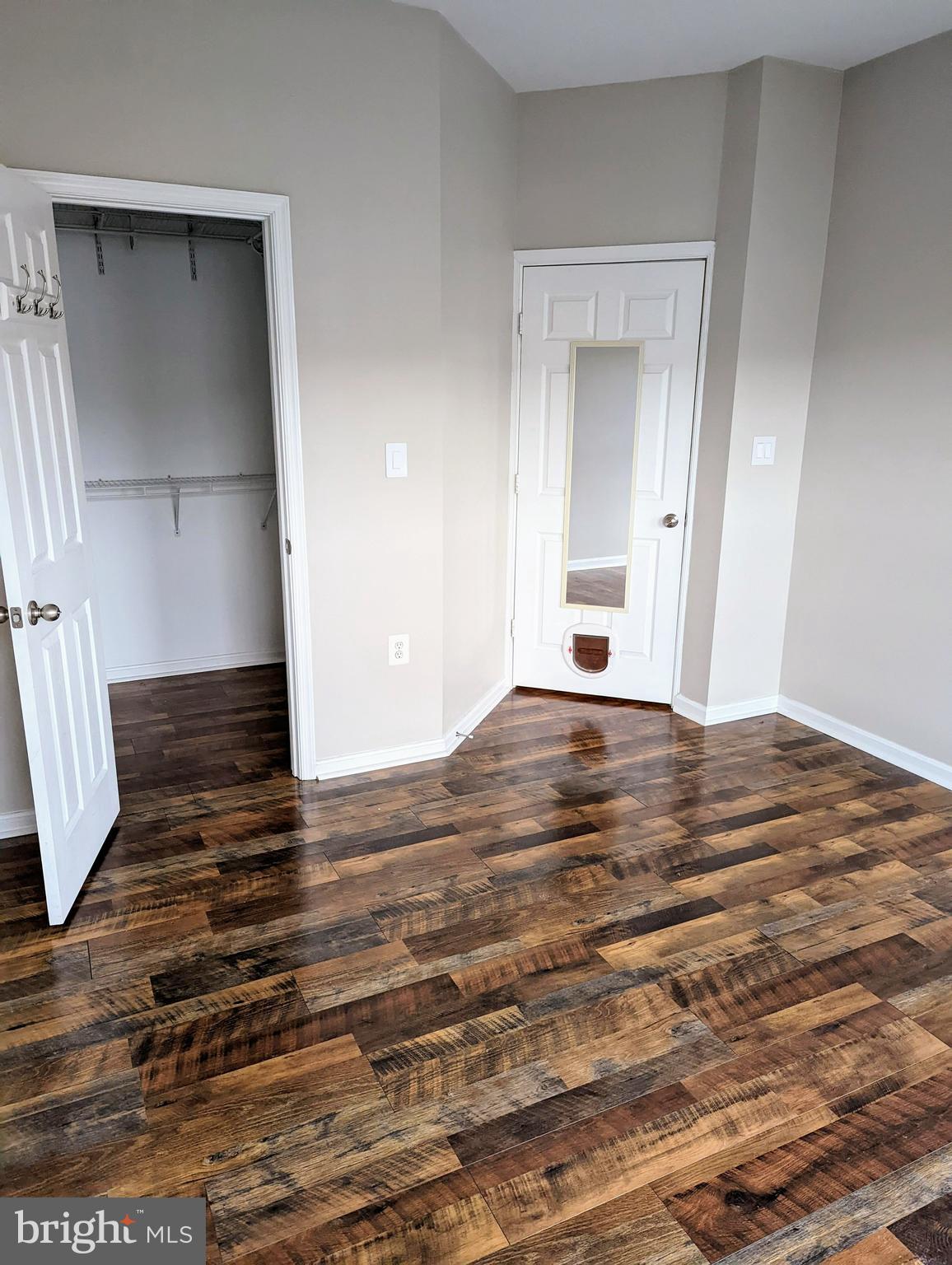 21765 Ascot Court Ashburn, VA 20147 - Photo 28 of 32 a view of a room with wooden floor