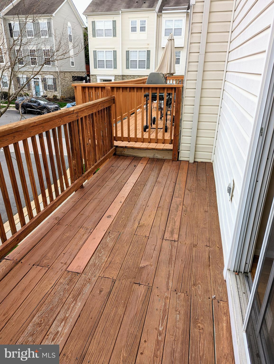 21765 Ascot Court Ashburn, VA 20147 - Photo 30 of 32 a balcony with wooden floor