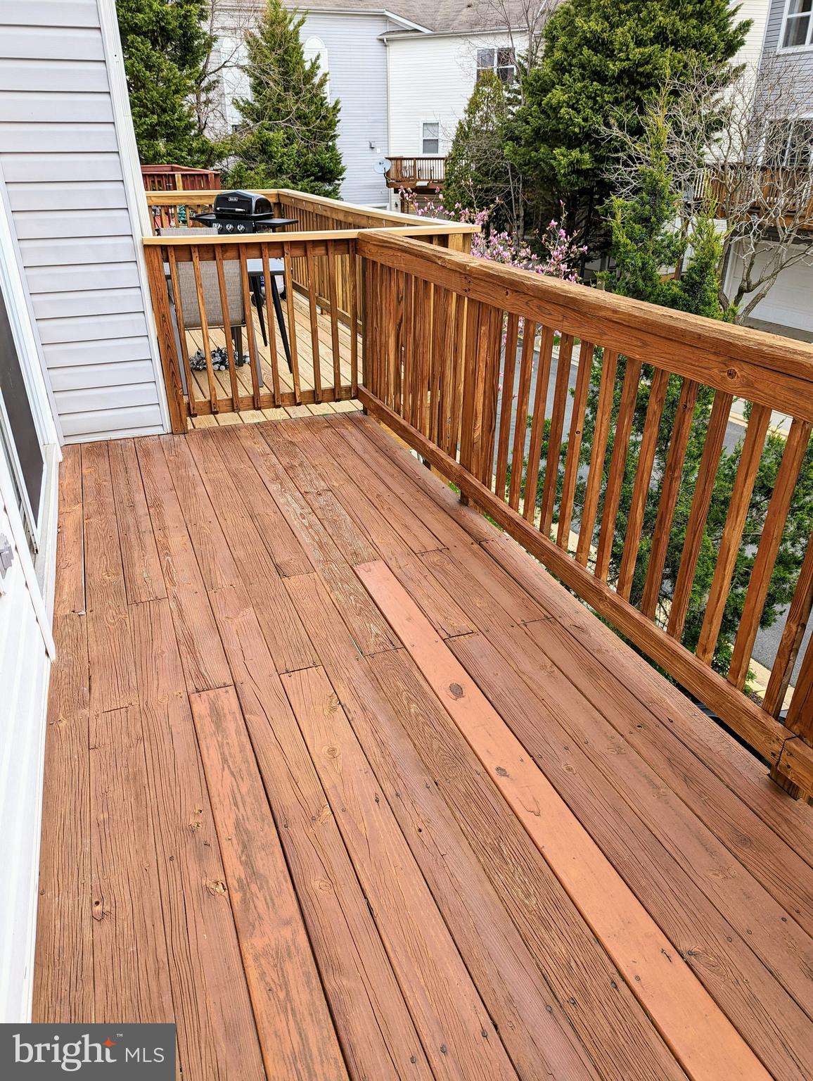 21765 Ascot Court Ashburn, VA 20147 - Photo 31 of 32 a balcony with wooden floor