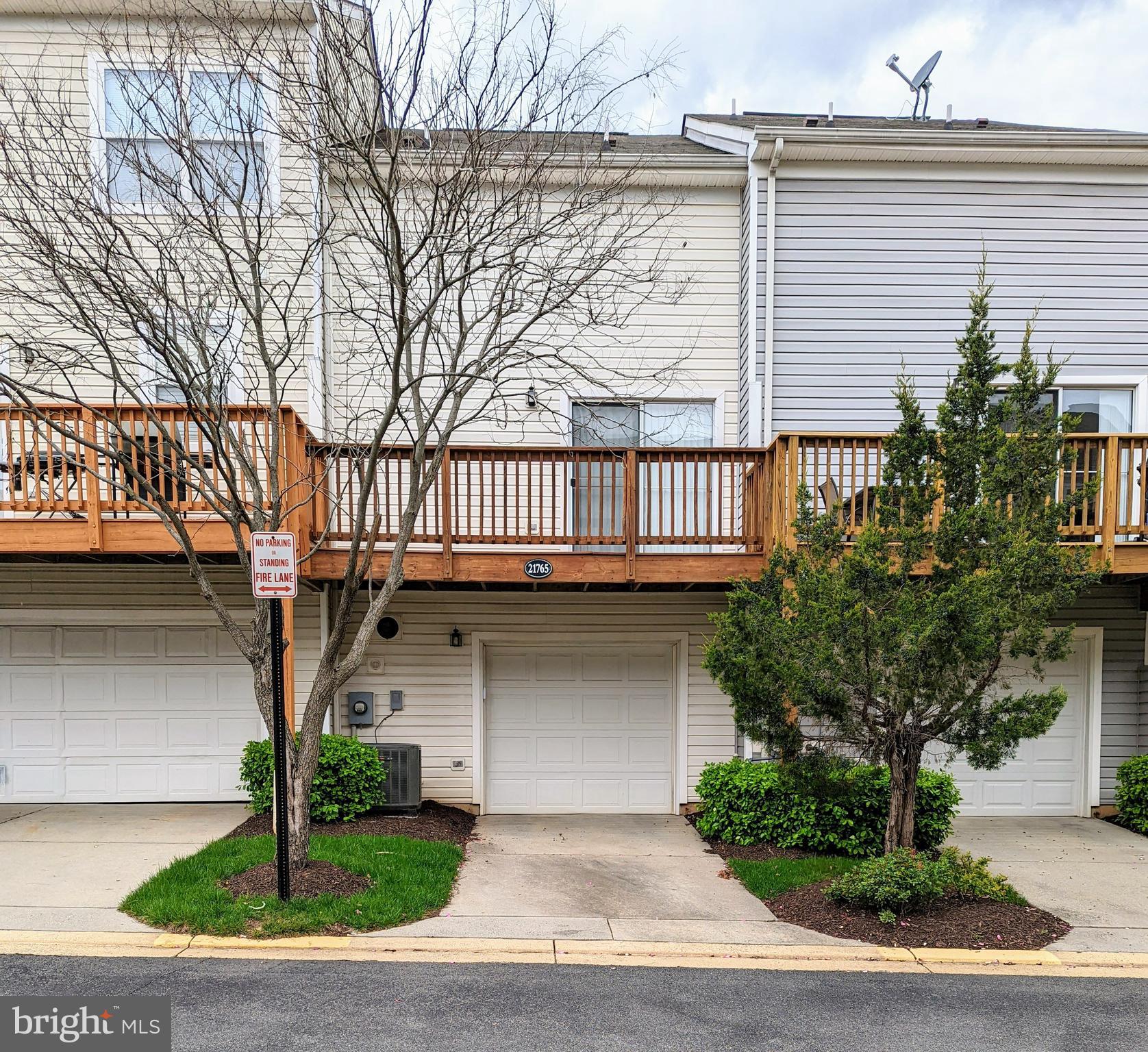 21765 Ascot Court Ashburn, VA 20147 - Photo 32 of 32 a front view of a house with garden
