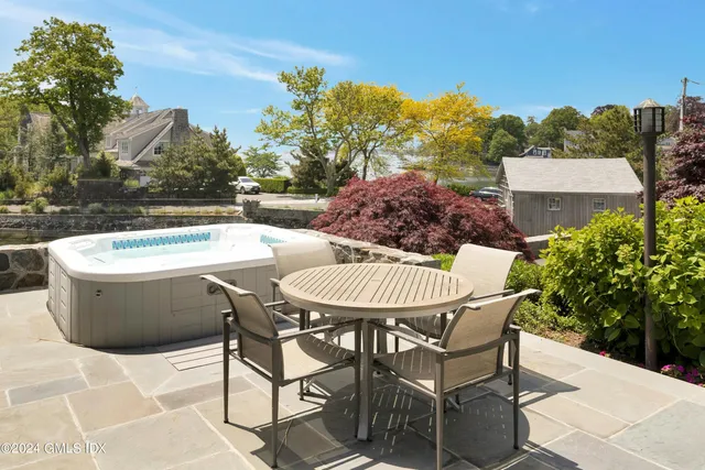 a view of a chairs and table in the terrace