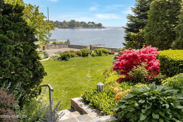 a view of a lake with a building in the background