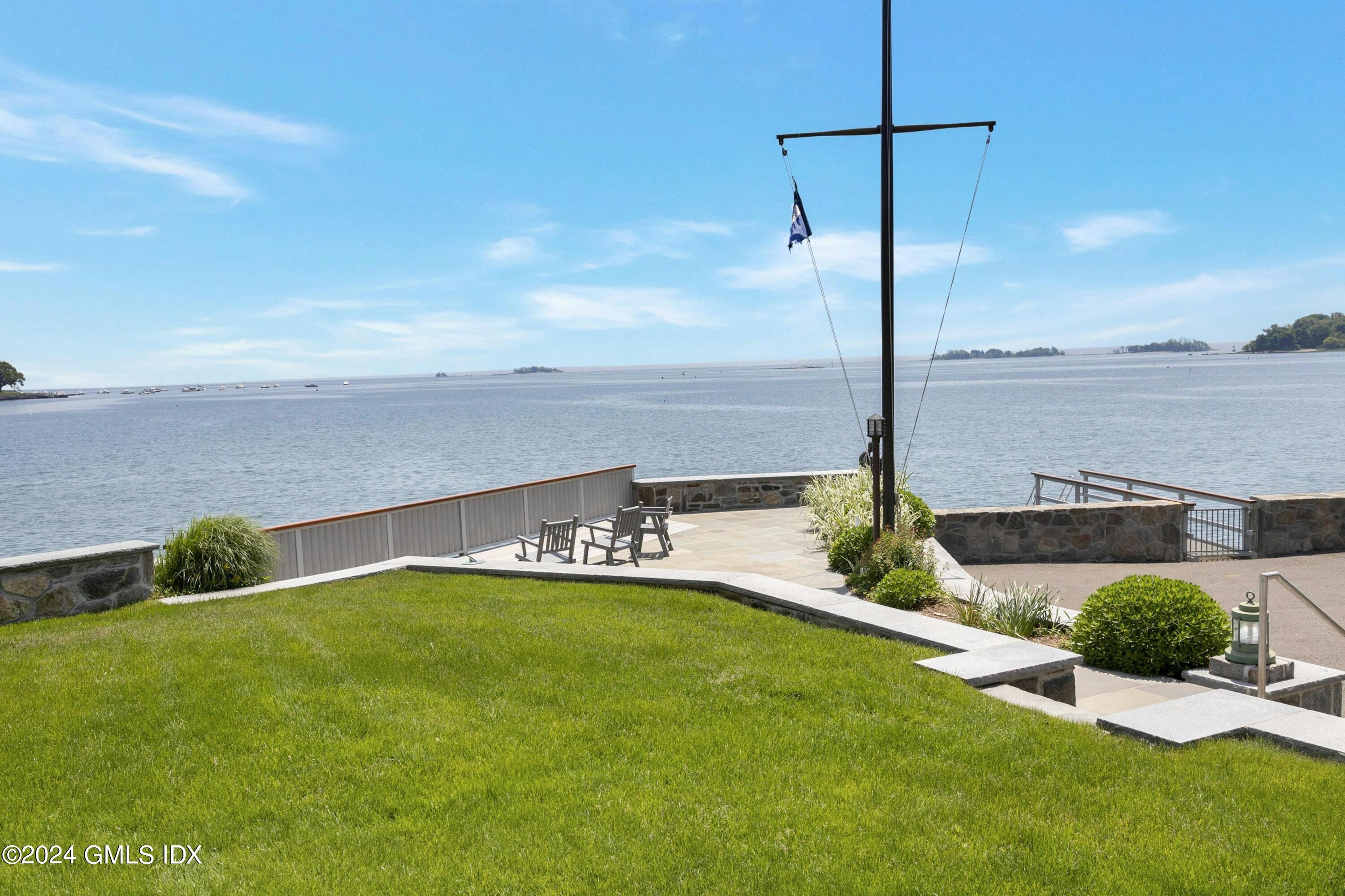 36-38 Game Cock Road Greenwich, CT 06830 - Photo 28 of 34 a view of a garden with lawn chairs