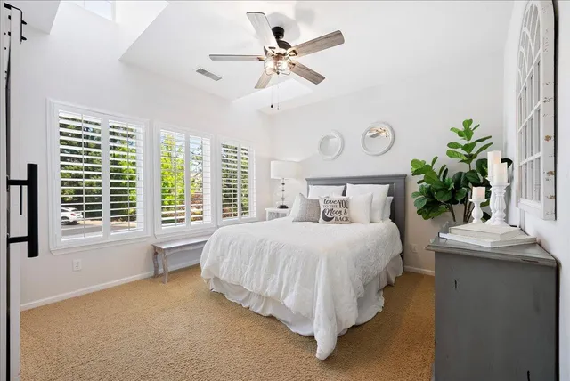a view of a bathroom from a hallway